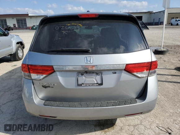 2016 Honda Odyssey EX-L with VIN 5FNRL5H67GB026899, listed as a Copart auction lot 51612295 with 74,010 mi miles and Salvage Title. Bid and sale history available at DreamBid. Image 6.