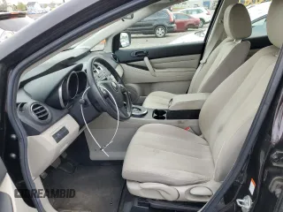 2010 Mazda CX-7 SV z VIN JM3ER2WMXA0341433, wystawiony jako Copart lot #53474815 z przebiegiem 106 410 mil mil oraz Czysty tytuł • Clean title. Historia ofert i sprzedaży dostępna na DreamBid. Obrazek 7.