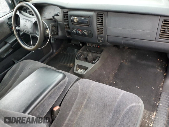 2001 Dodge Dakota Sport z VIN 1B7GL22N31S137577, wystawiony jako Copart lot #50119405 z przebiegiem Nie podano mil oraz Czysty tytuł • Clean title. Historia ofert i sprzedaży dostępna na DreamBid. Obrazek 8.
