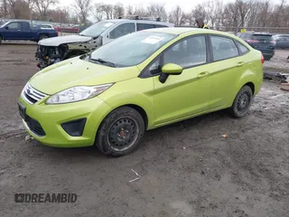 2012 Ford Fiesta SE with VIN 3FADP4BJ1CM140589, listed as a IAAI auction lot 41870344 with 158,558 mi miles. Bid and sale history available at carsss.com. Image 2.