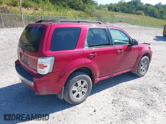 2011 Mercury Mariner with VIN 4M2CN8B77BKJ04817, listed as a IAAI auction lot 40493583 with 292,950 mi miles and . Bid and sale history available at DreamBid. Image 4.