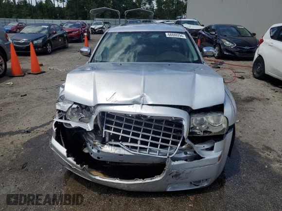 2005 Chrysler 300 with VIN 2C3AA63H95H591782, listed as a Copart auction lot 68888294 with 192,568 mi miles and Salvage Title. Bid and sale history available at carsss.com. Image 5.