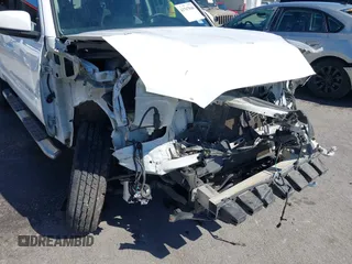 2018 Toyota Tacoma SR5 with VIN 5TFAZ5CN4JX056465, listed as a IAAI auction lot 41767848 with 71,532 mi miles and . Bid and sale history available at DreamBid. Image 19.