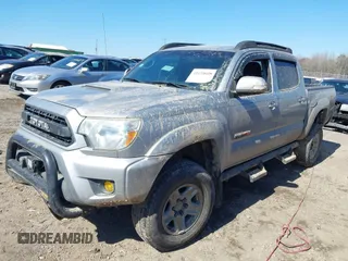 2015 Toyota Tacoma with VIN 5TFLU4EN7FX118530, listed as a IAAI auction lot 41638608 with 116,143 mi miles and . Bid and sale history available at DreamBid. Image 2.
