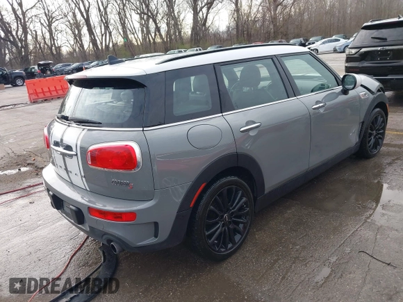 2017 MINI Clubman Cooper S with VIN WMWLU5C59H2E83705, listed as a IAAI auction lot 41853702 with 135,905 mi miles. Bid and sale history available at carsss.com. Image 4.