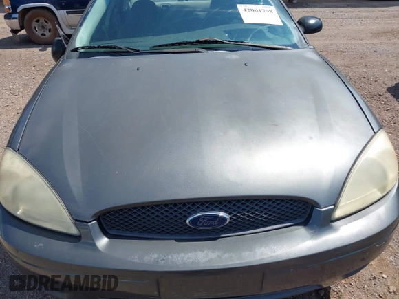2005 Ford Taurus SE with VIN 1FAFP532X5A272398, listed as a IAAI auction lot 42001798 with 159,199 mi miles. Bid and sale history available at carsss.com. Image 10.
