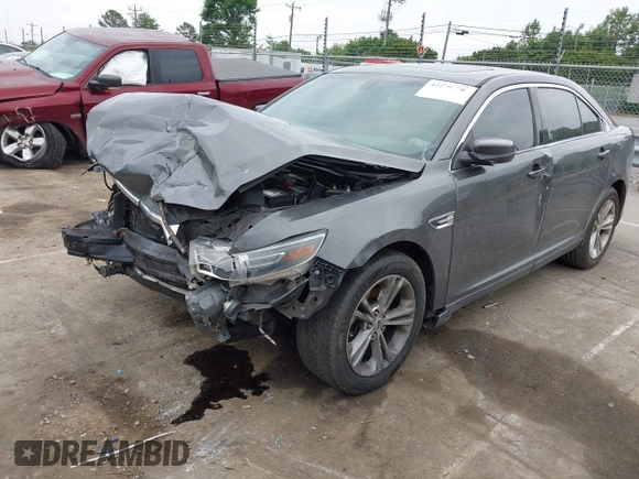 2015 Ford Taurus SEL z VIN 1FAHP2E81FG163058, wystawiony jako IAAI lot #42279778 z przebiegiem 127 957 mil mil oraz . Historia ofert i sprzedaży dostępna na DreamBid. Obrazek 6.