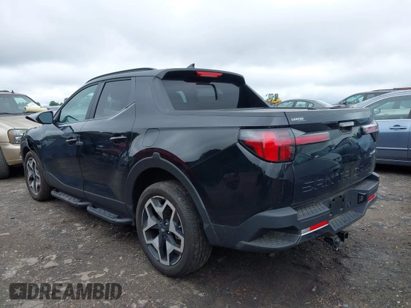 2022 Hyundai Santa Cruz Limited z VIN 5NTJEDAF3NH010999, wystawiony jako IAAI lot #42234746 z przebiegiem 18 463 mil mil oraz . Historia ofert i sprzedaży dostępna na DreamBid. Obrazek 3.