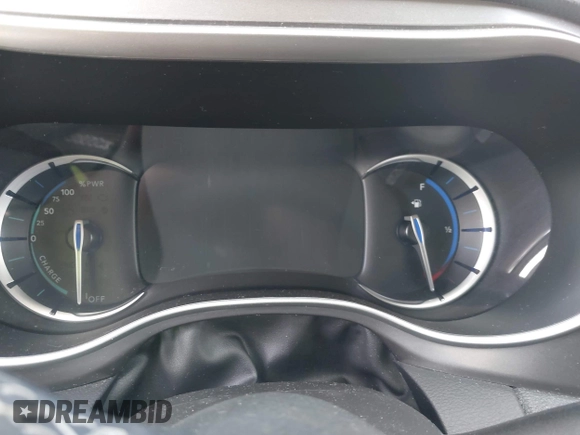 2023 Chrysler Pacifica Hybrid Touring L with VIN 2C4RC1L74PR579782, listed as a IAAI auction lot 42487390 with Not provided miles and . Bid and sale history available at DreamBid. Image 7.
