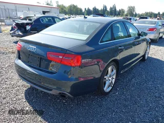 2015 Audi A6 Premium Plus with VIN WAUFGAFC9FN003498, listed as a IAAI auction lot 42652995 with 53,880 mi miles and . Bid and sale history available at DreamBid. Image 4.