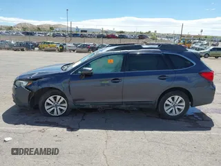 2015 Subaru Outback Premium with VIN 4S4BSBFC6F3282566, listed as a IAAI auction lot 42246387 with 208,467 mi miles and . Bid and sale history available at DreamBid. Image 14.