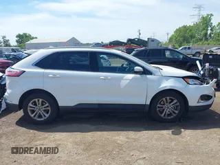 2020 Ford Edge SEL z VIN 2FMPK4J90LBA28960, wystawiony jako IAAI lot #42264189 z przebiegiem 91 312 mil mil oraz . Historia ofert i sprzedaży dostępna na DreamBid. Obrazek 13.