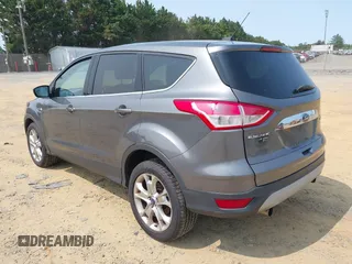 2013 Ford Escape SEL with VIN 1FMCU9H99DUC25469, listed as a IAAI auction lot 42402148 with 99,830 mi miles and . Bid and sale history available at DreamBid. Image 3.