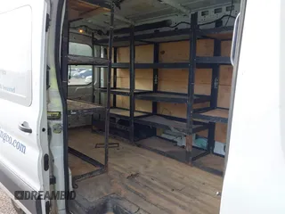 2015 Ford Transit Cargo with VIN 1FTNE2CM7FKA78466, listed as a IAAI auction lot 42074455 with 214,797 mi miles and . Bid and sale history available at carsss.com. Image 8.