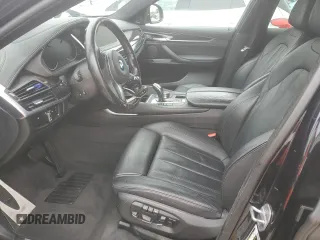 2018 BMW X6 xDrive35i z VIN 5UXKU2C52J0X49351, wystawiony jako Copart lot #55630745 z przebiegiem 139 605 mil mil oraz Tytuł czysty. Historia ofert i sprzedaży dostępna na DreamBid. Obrazek 7.
