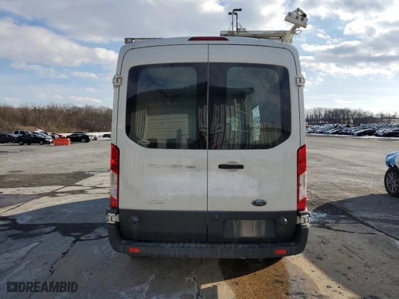 2016 Ford Transit Cargo Van with VIN 1FTYR2CGXGKB30136, listed as a Copart auction lot 89067675 with 141,445 mi miles and Clean Title. Bid and sale history available at carsss.com. Image 6.