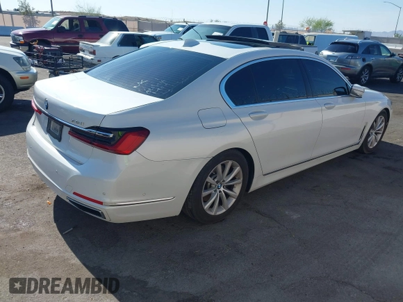 2020 BMW 7 Series 740i with VIN WBA7T2C0XLGL17774, listed as a IAAI auction lot 42278067 with 100,465 mi miles and . Bid and sale history available at DreamBid. Image 4.