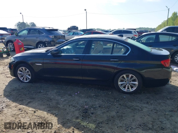 2015 BMW 5 Series 528i with VIN WBA5A5C56FD519138, listed as a IAAI auction lot 41989497 with 214,326 mi miles and . Bid and sale history available at DreamBid. Image 14.
