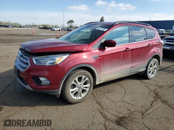 2018 Ford Escape SE z VIN 1FMCU9GD0JUC29279, wystawiony jako Copart lot #54511595 z przebiegiem 77 547 mil mil oraz Czysty tytuł • Clean title. Historia ofert i sprzedaży dostępna na DreamBid. Obrazek 1.