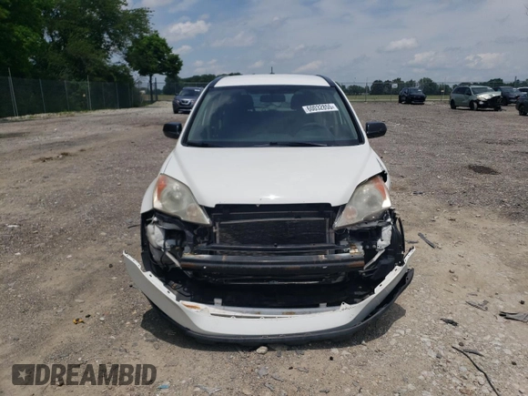 2010 Honda CR-V LX with VIN 3CZRE3H35AG705585, listed as a Copart auction lot 60032855 with 115,136 mi miles and Salvage title. Bid and sale history available at DreamBid. Image 5.
