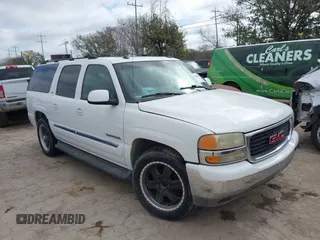 2004 GMC Yukon XL SLT with VIN 3GKEC16Z34G162090, listed as a IAAI auction lot 41600676 with 184,765 mi miles. Bid and sale history available at carsss.com. Image 1.