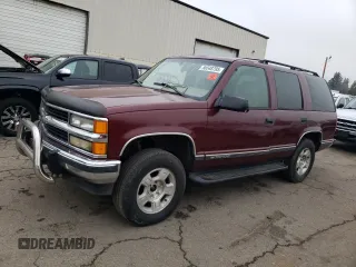 1999 Chevrolet Tahoe Z71 with VIN 1GNEK13R8XJ530020, listed as a Copart auction lot 46325435 with 409,412 mi miles and Salvage Title. Bid and sale history available at DreamBid. Image 1.
