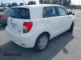2010 Scion xD with VIN JTKKU4B48AJ053828, listed as a IAAI auction lot 41959804 with 255,337 mi miles. Bid and sale history available at carsss.com. Image 4.