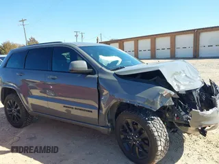 2019 Jeep Grand Cherokee Laredo E with VIN 1C4RJFAG2KC855108, listed as a IAAI auction lot 41780277 with 81,283 mi miles and . Bid and sale history available at DreamBid. Image 14.
