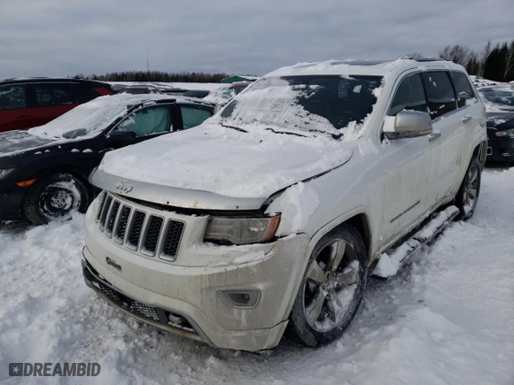 2014 Jeep Grand Cherokee Overland with VIN 1C4RJFCM9EC367863, listed as a Copart auction lot 43227105 with 221,273 mi miles and Salvage Title. Bid and sale history available at carsss.com. Image 1.