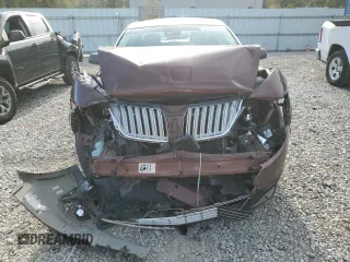 2012 Lincoln MKS with VIN 1LNHL9ERXCG801273, listed as a Copart auction lot 82476574 with 203,370 mi miles and Salvage Title. Bid and sale history available at DreamBid. Image 5.