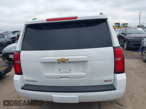 2017 Chevrolet Tahoe LT with VIN 1GNSKBKC1HR401044, listed as a IAAI auction lot 41573362 with 103,865 mi miles and . Bid and sale history available at DreamBid. Image 16.