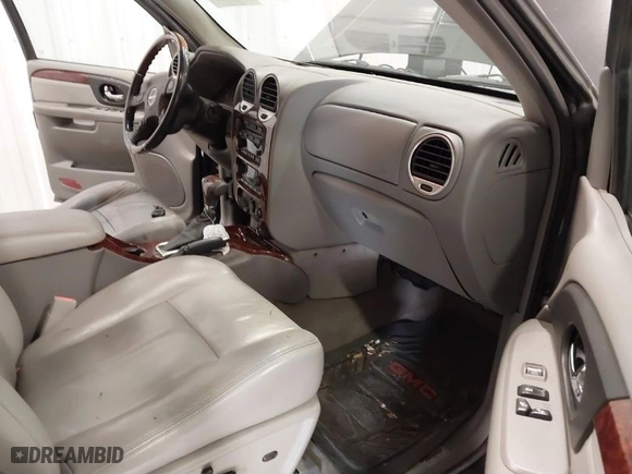 2006 GMC Envoy Denali with VIN 1GKET63M662310282, listed as a IAAI auction lot 41367523 with 216,451 mi miles. Bid and sale history available at carsss.com. Image 5.