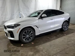 2023 BMW X6 xDrive40i z VIN 5UXCY6C09P9R79459, wystawiony jako Copart lot #51134585 z przebiegiem 33 867 mil mil oraz Tytuł czysty. Historia ofert i sprzedaży dostępna na DreamBid. Obrazek 1.
