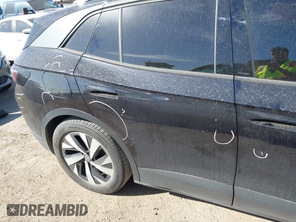 2023 Volkswagen ID.4 Pro with VIN 1V2CMPE82PC008195, listed as a IAAI auction lot 41828830 with 32,336 mi miles and . Bid and sale history available at DreamBid. Image 21.