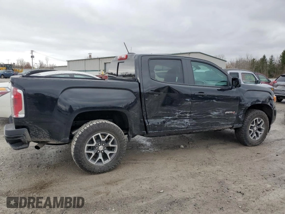 2022 GMC Canyon 4WD AT4 w/Leather with VIN 1GTG6FEN5N1279158, listed as a Copart auction lot 50958545 with 34,569 mi miles and Salvage Title. Bid and sale history available at carsss.com. Image 3.