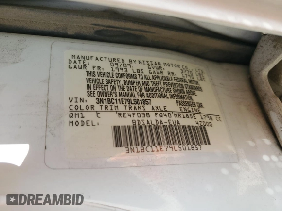2009 Nissan Versa S z VIN 3N1BC11E79L501857, wystawiony jako Copart lot #58256025 z przebiegiem 156 313 mil mil oraz Szkoda całkowita • Salvage title. Historia ofert i sprzedaży dostępna na DreamBid. Obrazek 12.