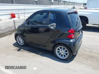 2014 Smart fortwo Pure with VIN WMEEJ3BA1EK752202, listed as a IAAI auction lot 42672207 with 65,736 mi miles and . Bid and sale history available at DreamBid. Image 3.