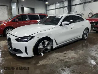 2024 BMW i4 xDrive40 with VIN WBY83FB06RFT27327, listed as a Copart auction lot 84040704 with 5,137 mi miles and Salvage Title. Bid and sale history available at carsss.com. Image 1.