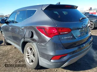 2017 Hyundai Santa Fe 2.4L with VIN 5XYZTDLB0HG453575, listed as a IAAI auction lot 41036334 with 114,031 mi miles and . Bid and sale history available at DreamBid. Image 6.