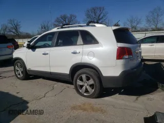 2012 Kia Sorento EX z VIN 5XYKUDA23CG291368, wystawiony jako Copart lot #42061635 z przebiegiem 134 472 mil mil oraz Szkoda całkowita • Salvage title. Historia ofert i sprzedaży dostępna na DreamBid. Obrazek 2.