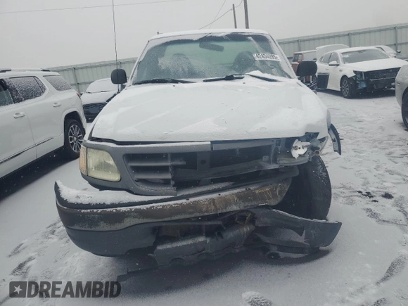2001 Ford F-150 XL with VIN 2FTPF18Z81CA84228, listed as a Copart auction lot 42434285 with 83,435 mi miles and Salvage title. Bid and sale history available at DreamBid. Image 5.