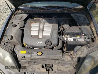 2003 Hyundai Tiburon GT z VIN KMHHN65F13U084620, wystawiony jako Copart lot #46880185 z przebiegiem Nie podano mil oraz Nie do naprawy • Non repairable. Historia ofert i sprzedaży dostępna na DreamBid. Obrazek 11.