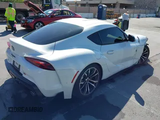 2021 Toyota Supra 2.0 with VIN WZ1DB2C01MW039946, listed as a IAAI auction lot 42519516 with 21,073 mi miles and . Bid and sale history available at DreamBid. Image 4.