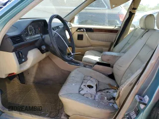 1992 Mercedes-Benz 400 with VIN WDBEA34E6NB743461, listed as a Copart auction lot 67982874 with 193,749 mi miles and Salvage Title. Bid and sale history available at carsss.com. Image 7.