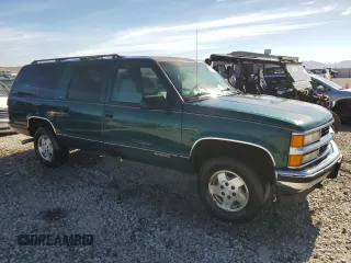 1995 Chevrolet Suburban with VIN 1GNFK16K6SJ398208, listed as a Copart auction lot 55222954 with 131,045 mi miles and Salvage Title. Bid and sale history available at carsss.com. Image 4.