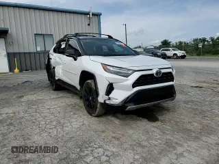 2023 Toyota RAV4 Hybrid XSE with VIN 2T3E6RFVXPW040152, listed as a Copart auction lot 61645565 with 26,408 mi miles and Salvage title. Bid and sale history available at DreamBid. Image 14.