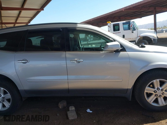 2013 Chevrolet Traverse LT with VIN 1GNKVGKD7DJ198330, listed as a IAAI auction lot 41669654 with 185,602 mi miles and . Bid and sale history available at DreamBid. Image 13.