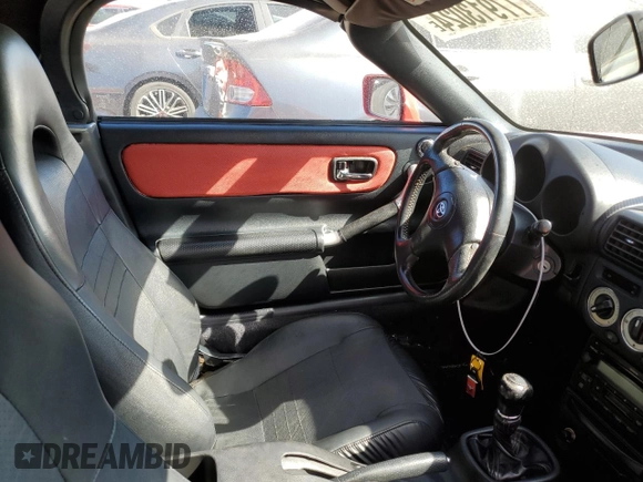 2004 Toyota MR2 z VIN JTDFR320840070477, wystawiony jako Copart lot #77913024 z przebiegiem 60 694 mil mil oraz Szkoda całkowita • Salvage title. Historia ofert i sprzedaży dostępna na DreamBid. Obrazek 7.