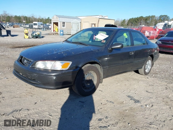 2001 Toyota Camry CE with VIN 4T1BG22K41U842473, listed as a IAAI auction lot 41858322 with 203,696 mi miles. Bid and sale history available at carsss.com. Image 2.