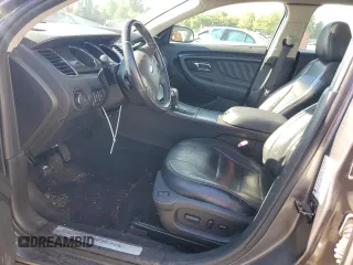 2011 Ford Taurus Limited z VIN 1FAHP2FW3BG146981, wystawiony jako Copart lot #58124275 z przebiegiem 64 163 mil mil oraz Szkoda całkowita • Salvage title. Historia ofert i sprzedaży dostępna na DreamBid. Obrazek 7.